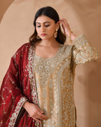 Organza suit with heavy zari and zarkan work