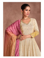 Maharani Royal Couture cream Anarkali gown with embroidered neckline and sleeves, paired with a pink and yellow Bandhani dupatta.