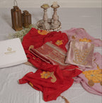 Maharani Royal Couture Banarasi silk suit in red and pink with intricate hand embroidery, sequins, pearls, and painted organza dupatta.