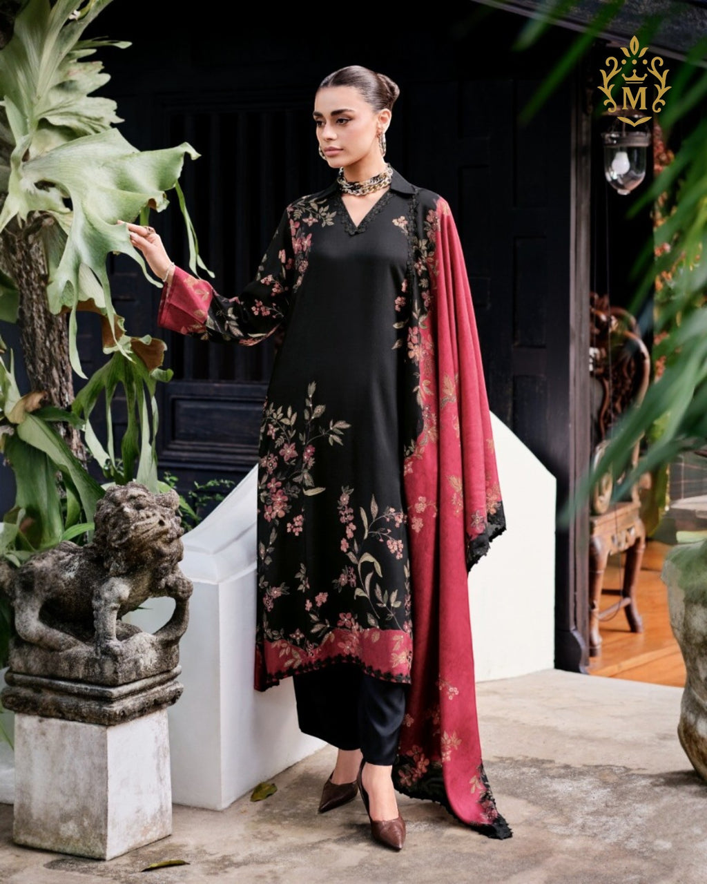 Maharani Royal Couture black viscose muslin suit with digital floral print, handwork, lace detailing, and maroon dupatta.
