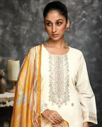 Maharani Royal Couture cream lawn cotton suit with intricate handwork embroidery on the neckline and lace border on sleeves and hem. Paired with a yellow digital print dupatta.