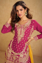 Maharani Royal Couture magenta chinon silk suit with heavy gold embroidery and handwork, palazzo pants, and embroidered dupatta.